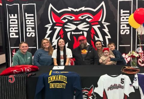 Wade Cheek/The Clayton Tribune. RCHS senior softball and basketball player Jacie McCall recently signed her NLI to play softball at the collegiate level with Emmanuel University in Franklin Springs. 