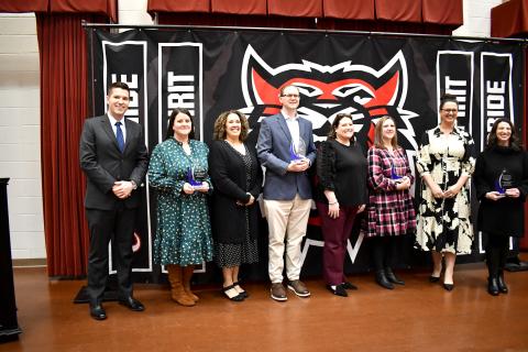 Megan Horn/The Clayton Tribune. The 2024-2025 Rabun County Schools Teachers of the Year (TOTY)were recognized during a special banquet and program on Nov. 21 in the Fine Arts Center (FAB) Band Room. Pictured are RCHS Principal Justin Spillers; RCHS TOTY Melissa Weeks; RCMS Principal Kechara Partin; RCMS and System TOTY Jason Crain; RCES Principal Keri Coleman; RCES TOTY Laurie Dills; RCPS Principal Carla Truelove; and RCPS TOTY Mary Dunham. 