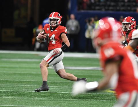 Wade Cheek/The Clayton Tribune. Former Rabun County football quarterback Gunner Stockton came into the second half of last Saturday’s SEC Championship against Texas after starting QB Carson Beck went down with an injury. Stockton led the now No. 2 Bulldogs to a 22-19 OT victory.
