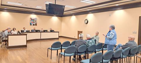 Megan Horn/The Clayton Tribune. Rabun County resident Julie Mayer speaks in favor of the school board opting out of HB 581 during the Jan. 20 public hearing held at the district office. 