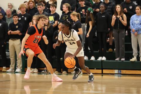 Wade Cheek/The Clayton Tribune. Sophomore shooting guard Brian Neely Jr. (24) scored nine points in the Indians’ region basketball game against George Walton Academy on Monday, Jan. 27. TFS defeated the Bulldogs 59-42. 