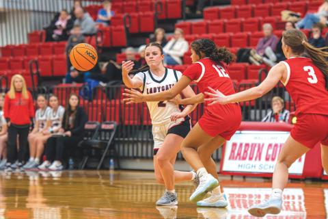 Wade Cheek/The Clayton Tribune. Junior Conley Spivey looks for open space on a fast-break against Providence Christian. The Lady Cats are 9-7 on the season.