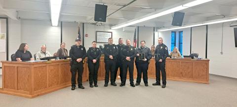 Megan Horn/The Clayton Tribune. Clayton Police Department Chief Andy Strait presents 2025 awards to officers and recognized their achievements during a special presentation at the Jan. 14 city council meeting. Pictured are Officer Jimmy Nations (left); Officer Sarah Chapman; Lt. Matthew Thomas; Sgt. Andy Beck; Strait; Officer Jay Chastain III; and Assistant Chief John Grist. 