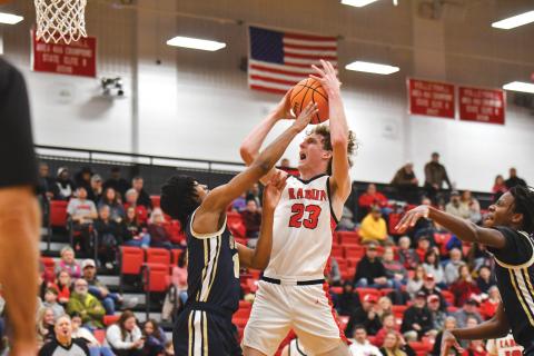 Wade Cheek/The Clayton Tribune. Rabun County junior post Hayes Free draws a foul at the rim during Rabun’s Sweet-16 loss to BEST Academy on Saturday, Feb. 22. Free scored a team-high 19 points against the Eagles. 