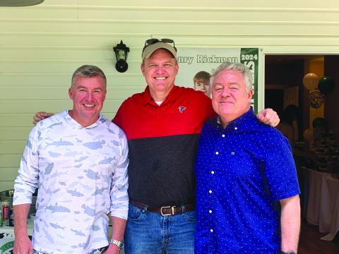Photo courtesy of Georgia Court of Appeals Judge Brian Rickman. Stockton & Stockton, LLC Attorney Allyn Stockton (left); Georgia Court of Appeals Judge Brian Rickman; and Superior Court Judge Russell “Rusty” Smith are pictured at a high school graduation party for Rickman’s son. 