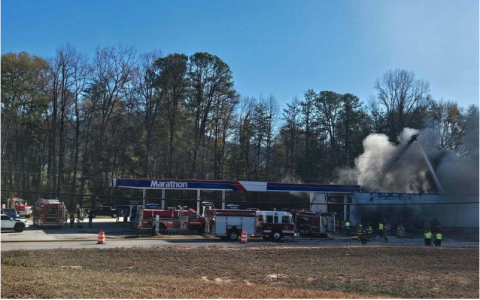 File Photo submitted by Megan Morris. Firefighters from Rabun County Fire Services Stations 5, 1, 6, 9, 12 as well as Otto (N.C.) Fire and Rescue work to extinguish a commercial structure fire at 6676 Highway 441 North (Marathon station) in Dillard on Saturday, Dec. 7, 2024. The building is a “total loss.”