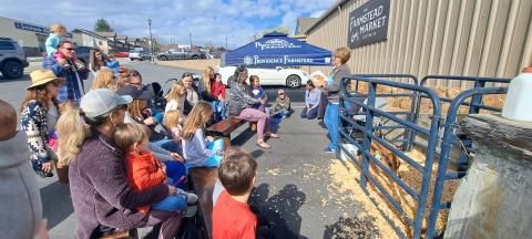 Megan Horn/The Clayton Tribune. Kim Cannon with Children’s Services at Rabun County Public Library reads “Miss MacDonald Had a Farm” by Kalee Gwarjanski during “On the Road Storytime.” 