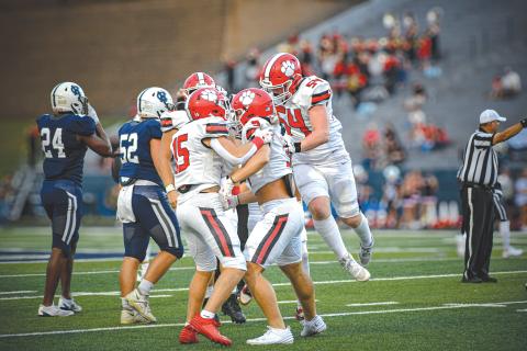 Wade Cheek/The Clayton Tribune. The Rabun County defense celebrates a turnover during its Week 1 win over White County in 2024.