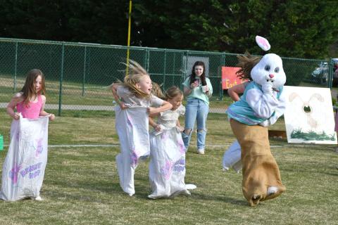 Enoch Autry/The Clayton Tribune. The Easter Bunny got so into the sack race that his ear popped off.