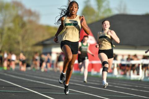Wade Cheek/The Clayton Tribune. Kada Augustin (left) and Cassidy Klimasewski (right) finished second and eighth in the girls 100-meter dash, respectively, in last Thursday’s meet at Stephens County High School. 