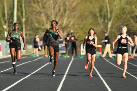 Wade Cheek/The Clayton Tribune. The Tallulah Falls School girls track and field team had five Lady Indians finish within the top 10 of the girls 100-meter dash event at Stephens County High School on Thursday, March 27. 