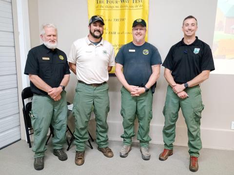  Pictured are Byron Haire, Lead Public Information Officer (PIO) for the Southern Area Gold Incident Management Team; Brent Saulsbury, Engine Boss and PIO for the Chattahoochee-Oconee National Forest; Jeffrey Schardt, district fire management officer for the United States Department of Agriculture (USDA) Forest Service; and Anthony English, Community Wildlife Defense Grant Coordinator for the Georgia Forestry Commission. 