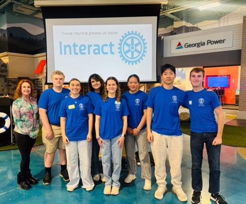 Photo courtesy of Tallulah Falls School. Clayton Rotary President Sheryl Webster, Tate Colston, Emma Ivester, history teacher Nancy Almoyan, Carsyn Griffis, Emily Cai, Danny An, and Timothy Beck participate in the annual Interact Conference in Cumming, Georgia.