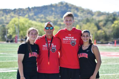 Wade Cheek/The Clayton Tribune. The RCHS track and field team held its senior night on Tuesday, April 15, honoring three seniors. Joined with head coach Tim Corbett are seniors (from left), Chloe Erlewine, G.B. Anderson and Arabella Kitchens. Not pictured are Clayton Blalock and Cameron Blalock. 