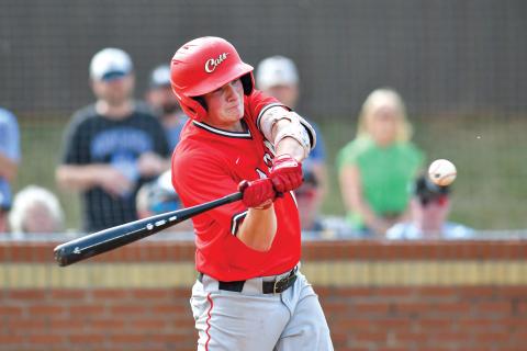 Wade Cheek/The Clayton Tribune. Senior first baseman Elvis Hunt cracks a double during Rabun’s playoff series with Bremen last Friday, April 25. The Wildcats lost 7-6 and 5-4, ending their season in the first round of the playoffs. 