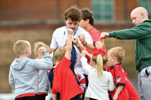Wade Cheek/The Clayton Tribune. Rising senior running back Lake Evans breaks the huddle down with a group of campers at Rabun County football’s youth camp on Saturday, May 10. The Tri-State camp had former Wildcat standouts Charlie Woerner and Bailey Fisher in attendance for the youth.