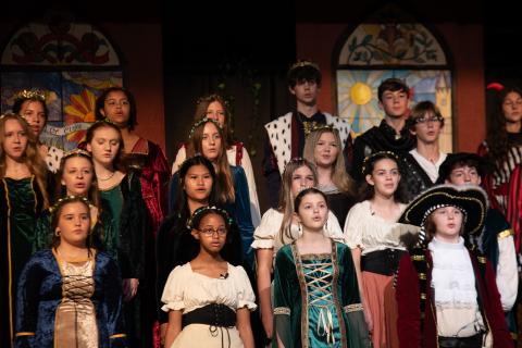 Photos courtesy TFS. TFS middle school students sing together as part of the 2025 Madrigal. Students bring acting, music, art, dance, and more to the yearly show.