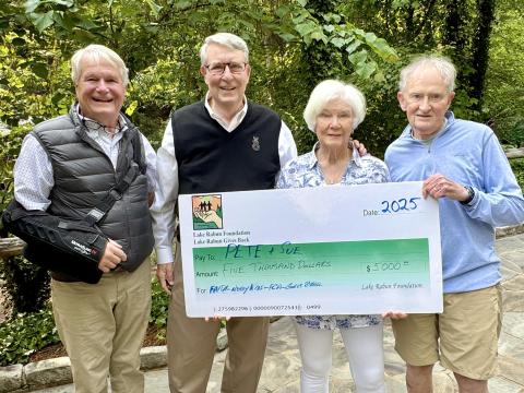 Photo courtesy of Richard Simms. Pictured are Buz Stone, who headed the LRA Foundation for 25 years and for whom the award is named, left; Pete Halter; Sue Halter; and Steve Raeber, executive director of the Lake Rabun Foundation. The Buz Stone Award was announced during the May 25 Lake Rabun Association (LRA) annual general membership meeting. Award recipients receive a $5,000 grant from the Lake Rabun Foundation to Rabun charities selected by the recipient. 