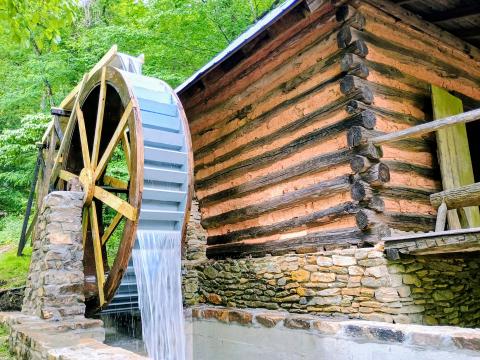 Megan Horn/The Clayton Tribune. The Gristmill water wheel is now moving as Foxfire recently refurbished the waterwheel and installed a circulating pump to get it working again in time for Heritage Days. Faircloth said the nonprofit wanted to get the water wheel up and running again because it was something visual and auditory that would appeal to the senses of visitors. He said it is historic because so many people had to use the Gristmill back in the day. 