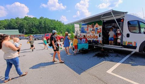 Megan Horn/The Clayton Tribune. The Northeast Georgia Regional Library System’s Bookmobile was on site at the Rabun County Public Library for the Summer Reading program launch on Tuesday, June 3, themed “Color Our World.” The Bookmobile is a scaled-down version of the library with its own collection. Its purpose is to bring services to people in Rabun County and the Northeast Georgia Regional Library System who may not be able to visit the library.