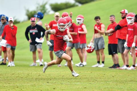 Wade Cheek/The Clayton Tribune. Rabun County senior running back Noah English finds space against Greene County at Athens Academy on Wednesday, June 4. 