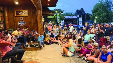 Photo courtesy Sonya Shook. Ramshackle’s headliner Town Mountain was unable to play on the main stage because of the June 7 rainstorm that got the area wet, but that did not keep the band from playing. “We were very thankful they played acoustic in front of Reeves Outdoor Center,” said Sonya Shook of Reeves and the CMBA president. “It was a cool experience for the fans that came and listened to them play.”