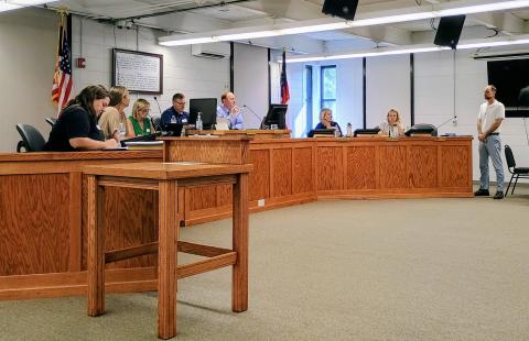 Megan Horn/The Clayton Tribune. Clayton City Attorney Mitch Baker talks about the alcohol ordinance and how it can be amended with more specific language during the July 8 work session and regular meeting of the Clayton city council.  Council members passed the first reading of the amended alcohol ordinance at a July 18 special called meeting. 