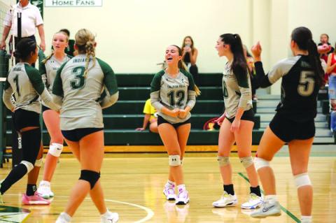Submitted Photo. Tallulah Falls volleyball players Margalida Amengual Sanchez and Shelby Simmons celebrate a point. The Lady Indians are now 11-5.