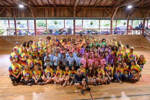 Zach Taylor/CNI News Service. PruittCares Executive Director Dave Lescalleet presented graduates Isai Bautista, Kionne James and Kaitlyn O’Donnell with “Keep Flying” bracelets to remind them of their higher purpose and drive throughout the following years of their lives after camp.