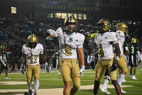 Wesley Branch/The Clayton Tribune. Rabun Gap senior and Indiana commit Walker Bryson celebrates in the end zone after a touchdown against Grayson in RGNS’s 24-19 loss to begin the season in a game with national football powerhouses.