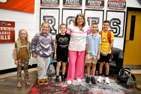 Megan Horn/The Clayton Tribune. Rabun County Elementary School (RCES) had its first day back on Monday, Aug. 4. Pictured at the start of the day are Hayden Worley, third grade; Emmaleigh Mathis, fourth grade; Jax Shook, fourth grade; RCES Principal Keri Coleman; Parker Satterfield, sixth grade; and Coleman Dixon, fourth grade.