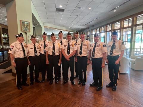 Photos courtesy Sherron Van Camp. The Grant Reeves Honor Guard posts the colors during a special ceremony honoring Purple Heart recipients hosted by the Sky Valley Property Owners Association (POA). Pictured are Doug Wayne, left, Bill Mc Allister, Jon Jones,  David Ruth,  Ed Hendricks, Gary Cantwell, Jim Morgan, Rick Chaffin, Kenneth Franklin and Brady Morgan.  