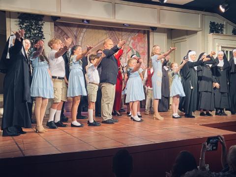 Photo courtesy Steven Webster. North Georgia Community Players actors take a stage bow after opening night of “The Sound of Music” last weekend. Pictured in the center are Anthony Schandel, who plays Captain Georg von Trapp, and Lucy Barry, who plays Maria. There are still two more weekends to see the show at the Dillard Theater, Aug. 15-17 and Aug. 22-24. 