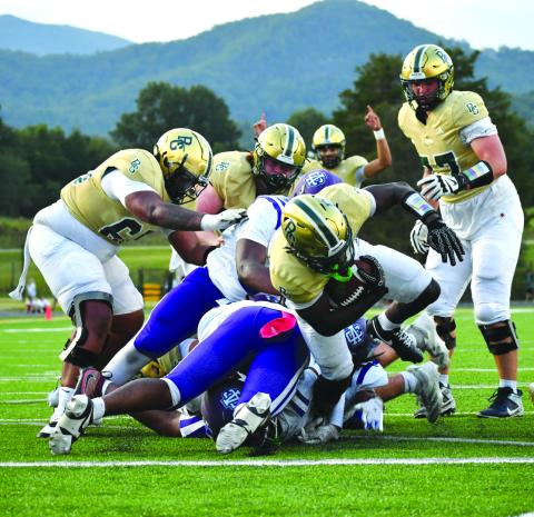 Enoch Autry/The Clayton Tribune. RGNS goes up 14-0 over Ambassador Christian in the first quarter as junior running back Jordan Lindo takes it into the end zone.