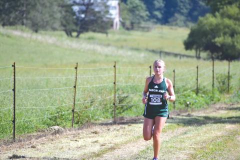 File Photo. Rabun Gap's Bailey Brackett set a new school record of 17:12.70, breaking her own previous record for the third time in her career.