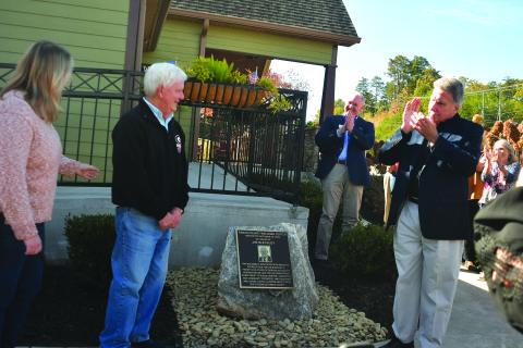 Enoch Autry/The Clayton Tribune. Jim Bleckley received an extra birthday surprise on Oct. 24 as the Rabun County Welcome Center was dedicated in his honor. Bleckley served as the county administrator for more than 24 years.