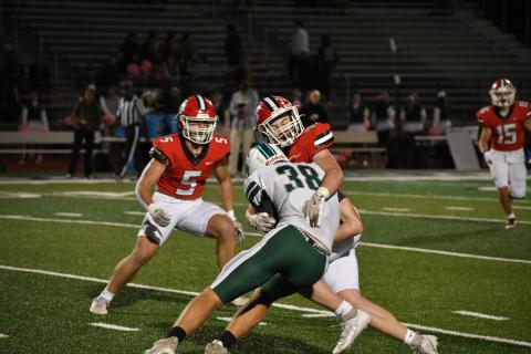 Wesley Branch/The Clayton Tribune. Rabun County defensive lineman Mack Williams tackles Tucker Rhodes in the Wildcats’ game against the Spartans. Williams finished the game with three total tackles and a sack. 