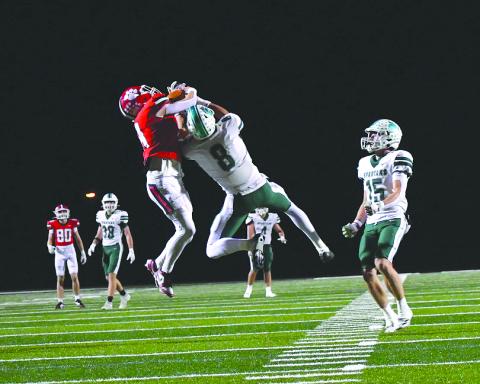 Enoch Autry/The Clayton Tribune. Rabun County sophomore wide receiver Colter Cannon hauls in a heavily contested 50-50 catch against Athens Academy on Friday, Oct. 24. Cannon’s only catch of the night, pictured above, went for 32 yards.