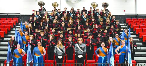 Submitted Photo. The RCHS marching band poses for a photo at the beginning of the school year. The Wildcats claimed straight superior rankings at the Berkmar Marching Invitational on Oct. 18 in Lilburn, Ga. While the marching competition season is complete, the band will play a Veterans Day concert of patriotic music with the RCHS chorus on Nov. 13. Then the band will share the stage with the middle school and elementary school bands at their Christmas concert on Dec. 9. Both concerts will be in the high sc