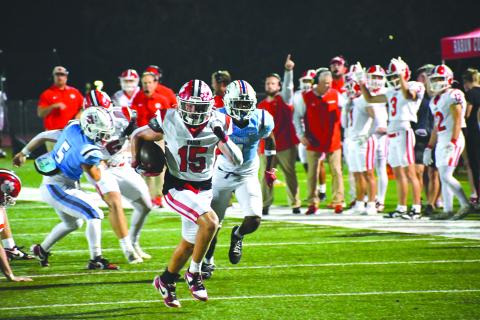Wesley Branch/The Clayton Tribune. Reid Giles runs down the field in Rabun County’s 62-21 win over Providence Christian Academy on Sept. 26. Giles led the Wildcats in rushing with 135 yards and a touchdown on nine carries. 