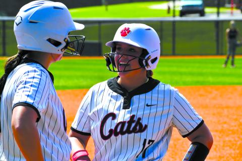 Wesley Branch/The Clayton Tribune. Rabun County Softball sophomore River Evans and senior Presley Burrell talk on third base during Rabun County’s 20-3 Aug. 16 win over Tallulah Falls. Both players earned all-region honors this season. 