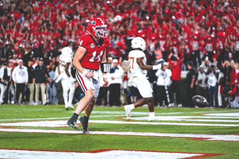 Tony Walsh/UGAAA. Former Rabun County and current Georgia quarterback Gunner Stockton celebrates in the end zone after a rushing touchdown in the Dawgs’ 35-10 win over Texas. Stockton accounted for all five of UGA’s scores.