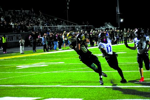Enoch Autry/The Clayton Tribune. Rabun Gap senior Isaac Obrokta, a Georgia Tech commit, pulls in a 39-yard touchdown reception from quarterback Gavin Owens in the Eagles’ 55-48 semifinal loss to Charlotte Christian on Nov. 14.