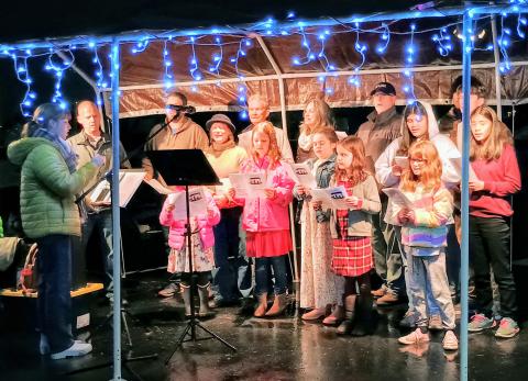 Megan Horn/The Clayton Tribune. Event-goers to a “Mountain City Christmas” on Thursday, Dec. 18, got the opportunity to hear caroling by First Christian Church of Mountain City. 