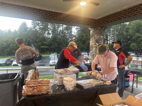 Submitted photo. Carpe Diem Rotary Impact Club members were often seen serving food in the band concession stands at the Rabun County Wildcats football games this season. 