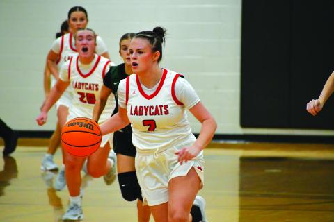 Wesley Branch/The Clayton Tribune. Rabun County junior guard Adelyn Thompson dribbles down the court in the Lady Cats’  53-45 win over North Hall on Nov. 25. Thompson scored 10 points and added two assists in the victory over the Trojans.