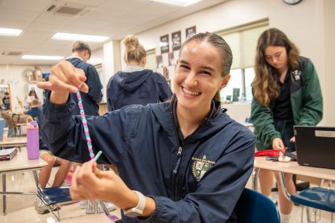 Photos courtesy Tallulah Falls School. Megan Prince creates bracelets for hospital care packages through the National Honor Society. She logged more than 26 service hours during the fall semester. 