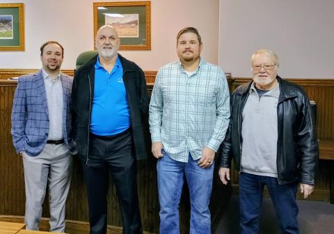 Megan Horn/The Clayton Tribune. The Clayton City Council will see new faces in 2026 after newly elected Channing Watts and Colt Woodall both took the Oath of Office to be official council members. Pictured are Woodall, Post 2 council member, left; Mayor Roy Quilliams; Watts, Post 1 council member; and incumbent Council Member Tony Allen. 