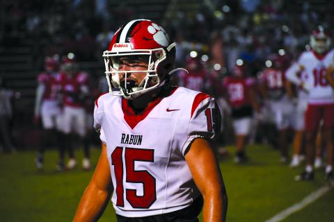 Wesley Branch/The Clayton Tribune. Rabun County senior Reid Giles looks to the sideline in Rabun County’s 49-42 win over Dalton on Sept. 5. Giles was named Georgia High School Football Daily Player of the Week for his performance versus Dalton and was named All-State this season. 