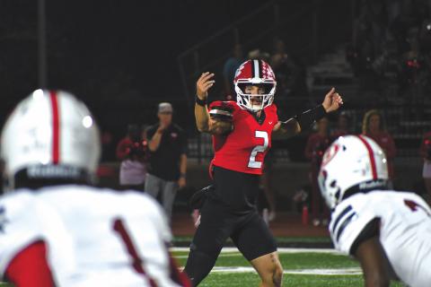 Wesley Branch/The Clayton Tribune. Rabun County senior quarterback Ty Truelove, an Erskine College commit, signals to his teammates before a play in Rabun County’s 35-0 win over Berrien in the second round of the GHSA state playoffs on Nov. 21, 2025. Truelove led the Wildcats to two state quarterfinal appearances in three years as a starter. 